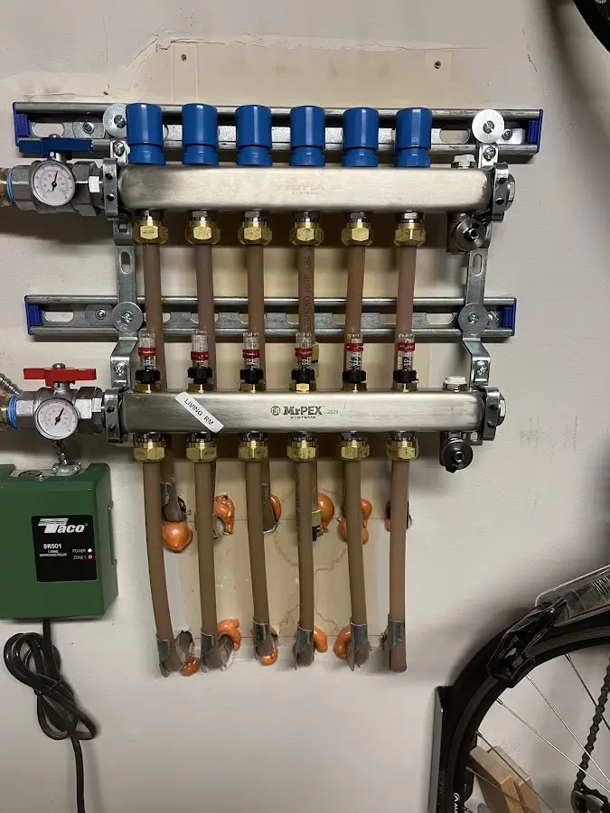 Plumber performing Water Heater Repair at a residential property in Penns Grove